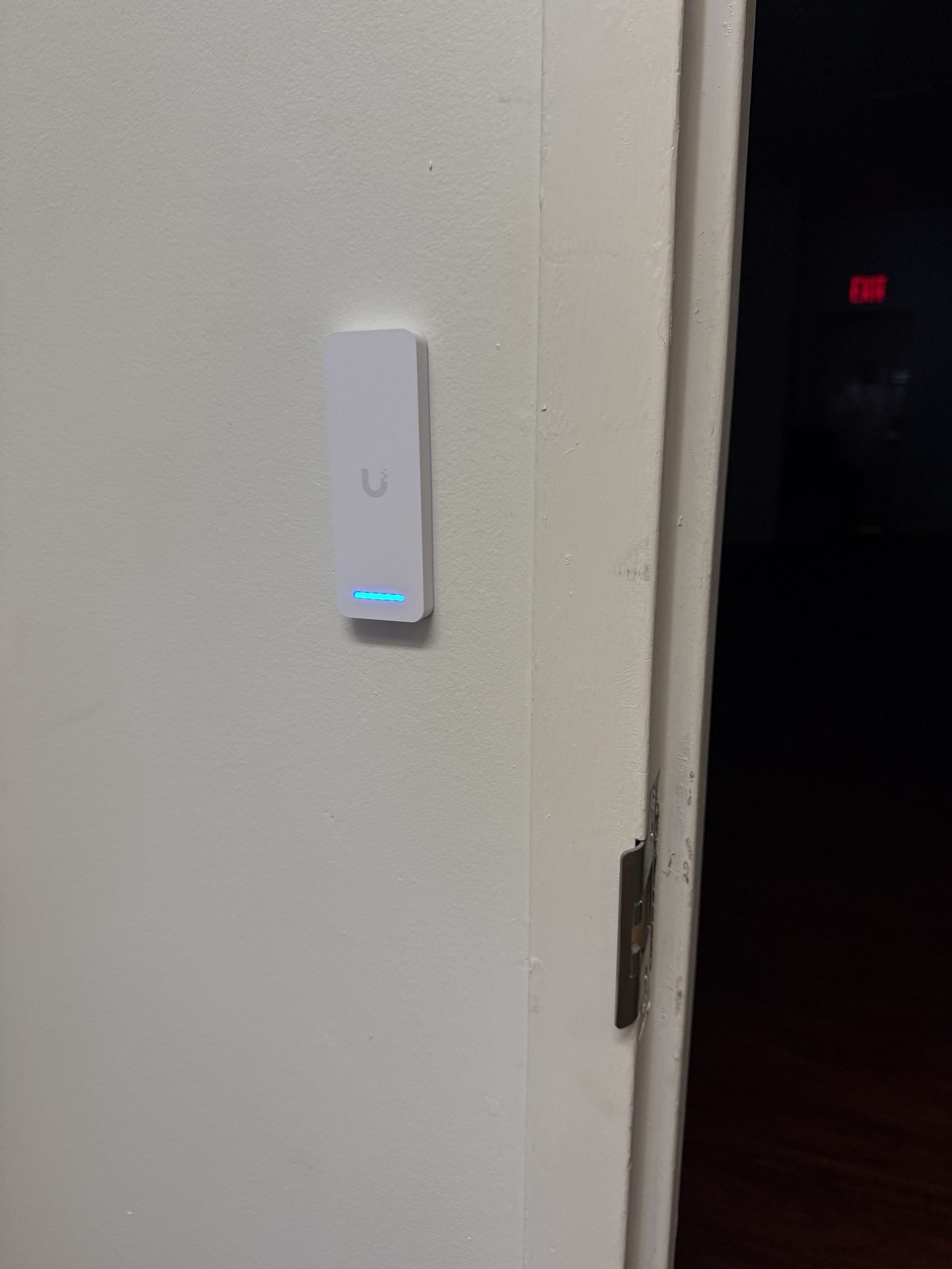 Access reader at the staff door. Fobs and phones, no keys to get back.